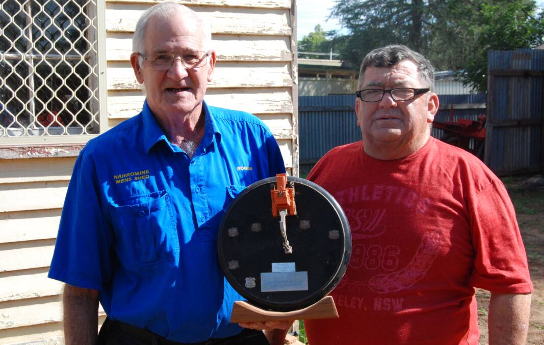 Roger Blackman and John Lenhan with the trophy they discovered