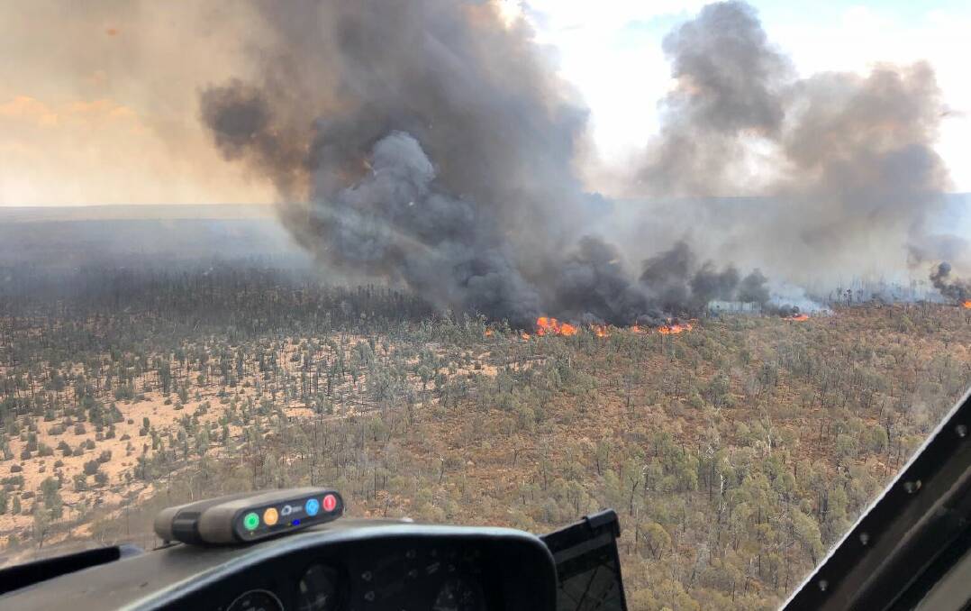 BLAZE: The bushfire burning through the Goonoo Forest is listed as 'being controlled' but the RFS warns smoke will still be visible on Wednesday night and into Thursday. Photo: NSW RFS