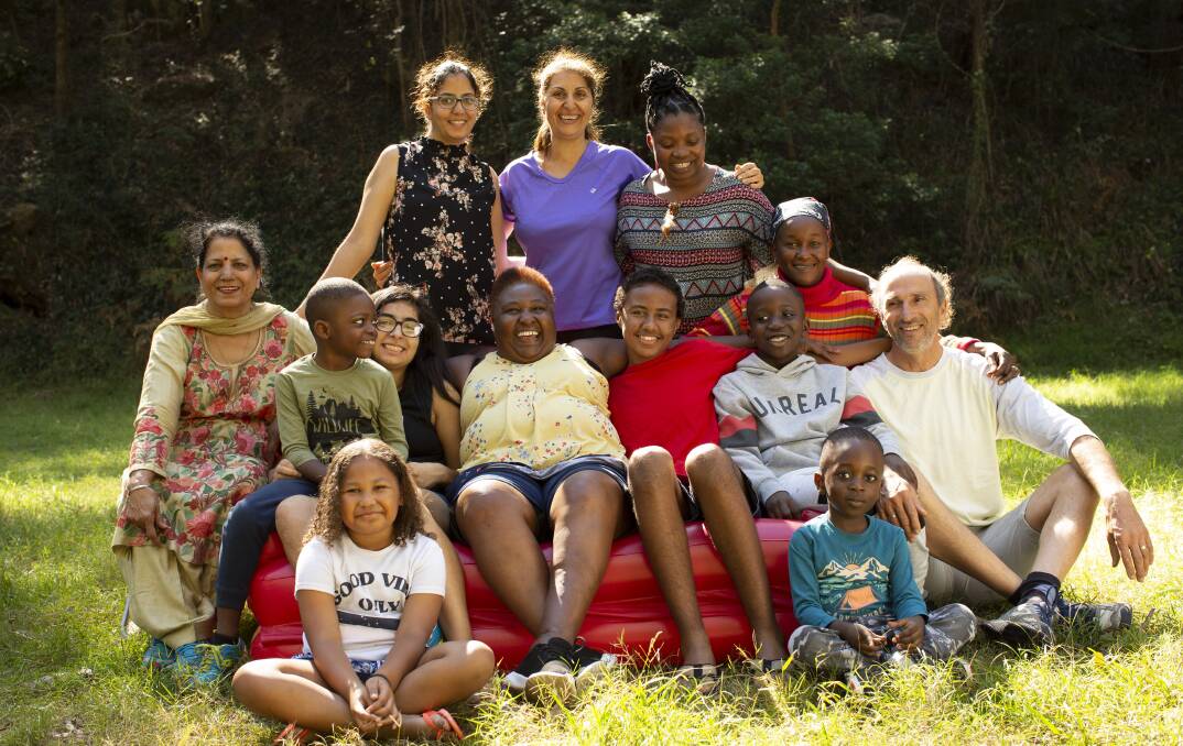 Rosemary Kariuki (seated, wearing yellow) will be at the Avalon screening of Rosemary's Way in August.