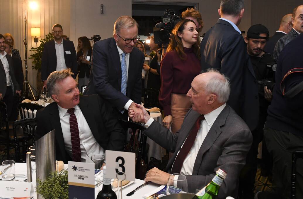 Anthony Albanese shakes Paul Keating's hand at the Australian Chamber of Commerce and Industry event on Thursday. Picture: AAP